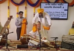 Dr. Cassio performing kirtan at Hicksville Gurdwara, NY with Parminder Singh Bhamra (pakhawaj) and Nirvair Kaur Khalsa (taus)